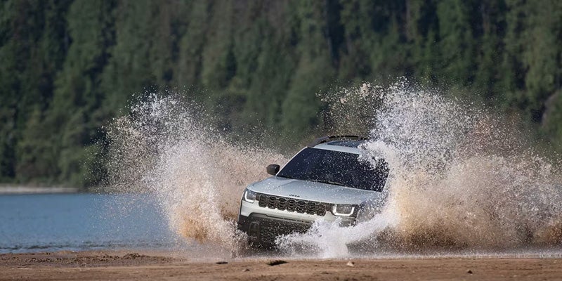 2026 Jeep Cherokee splashing through river near Dansville, NY